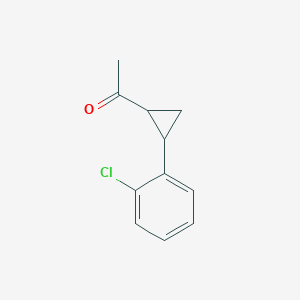 molecular formula C11H11ClO B1417329 1-[2-(2-Chlorophenyl)cyclopropyl]ethan-1-one CAS No. 875325-69-2