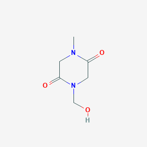 molecular formula C6H10N2O3 B141772 1-(Hydroxymethyl)-4-methylpiperazine-2,5-dione CAS No. 127605-74-7
