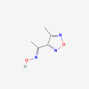 molecular formula C5H7N3O2 B1417825 (1E)-1-(4-methyl-1,2,5-oxadiazol-3-yl)ethanone oxime CAS No. 212254-68-7