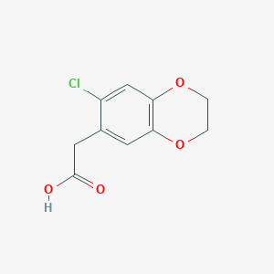 molecular formula C10H9ClO4 B1417856 (7-Chloro-2,3-dihydro-1,4-benzodioxin-6-YL)acetic acid CAS No. 915921-98-1
