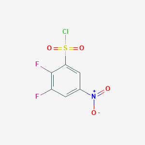 molecular formula C6H2ClF2NO4S B1418557 2,3-Difluoro-5-nitrobenzene-1-sulfonyl chloride CAS No. 1156136-97-8