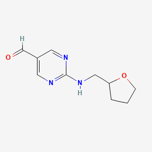 2-[(Tetrahydrofuran-2-ylmethyl)amino]pyrimidine-5-carbaldehyde