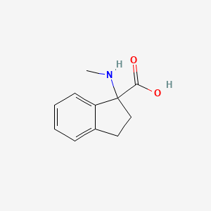 molecular formula C11H13NO2 B1419186 1-(methylamino)-2,3-dihydro-1H-indene-1-carboxylic acid CAS No. 1157935-94-8
