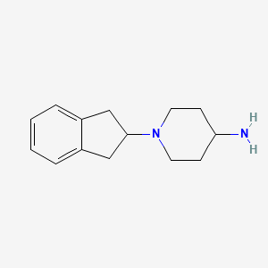 molecular formula C14H20N2 B1419250 1-(2,3-dihydro-1H-inden-2-yl)piperidin-4-amine CAS No. 1157983-92-0