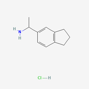 molecular formula C11H16ClN B1419426 1-(2,3-dihydro-1H-inden-5-yl)ethan-1-amine hydrochloride CAS No. 1009-18-3