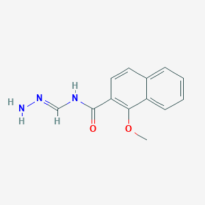 molecular formula C13H13N3O2 B14197554 N-[(E)-hydrazinylidenemethyl]-1-methoxynaphthalene-2-carboxamide 