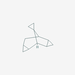 B142065 Spiro[cyclopropane-1,10-tetracyclo[4.3.1.02,4.07,9]decane], (1-alpha-,2-ba-,4-ba-,6-alpha-,7-ba-,9-b CAS No. 147085-41-4