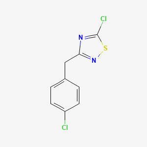 molecular formula C9H6Cl2N2S B1420859 5-chloro-3-[(4-chlorophenyl)methyl]-1,2,4-thiadiazole CAS No. 90418-16-9