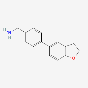 molecular formula C15H15NO B1421451 [4-(2,3-Dihydro-1-benzofuran-5-yl)phenyl]methanamine CAS No. 1183374-14-2