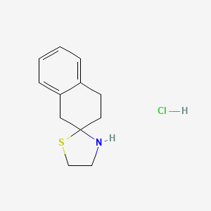 molecular formula C12H16ClNS B1421586 3,4-dihydro-1H-spiro[naphthalene-2,2'-[1,3]thiazolidine] hydrochloride CAS No. 1221792-02-4