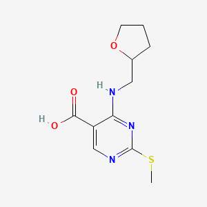 molecular formula C11H15N3O3S B1421656 2-(Methylthio)-4-((tetrahydrofuran-2-YL)methylamino)pyrimidine-5-carboxylic acid CAS No. 1065075-56-0