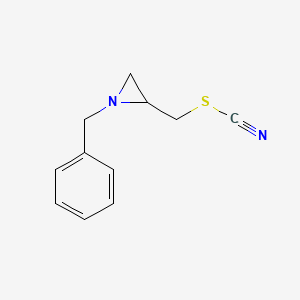 molecular formula C11H12N2S B14219699 Thiocyanic acid, [1-(phenylmethyl)-2-aziridinyl]methyl ester CAS No. 832724-78-4
