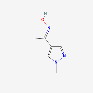 molecular formula C6H9N3O B1421973 N-[1-(1-methyl-1H-pyrazol-4-yl)ethylidene]hydroxylamine CAS No. 1221728-93-3