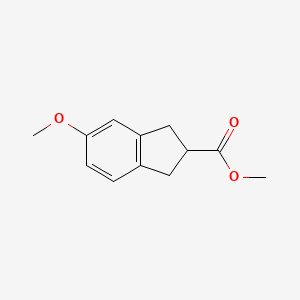 molecular formula C12H14O3 B1422672 5-甲氧基-2,3-二氢-1H-茚满-2-甲酸甲酯 CAS No. 65844-46-4