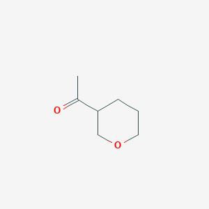 molecular formula C7H12O2 B1422707 1-(Oxan-3-yl)ethan-1-one CAS No. 1443981-45-0