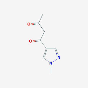 molecular formula C8H10N2O2 B1422795 1-(1-methyl-1H-pyrazol-4-yl)butane-1,3-dione CAS No. 1247584-05-9