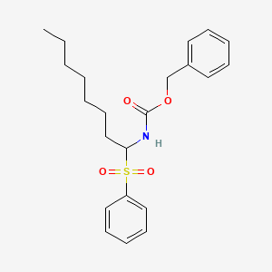 molecular formula C22H29NO4S B14236244 Carbamic acid, [1-(phenylsulfonyl)octyl]-, phenylmethyl ester CAS No. 253426-66-3