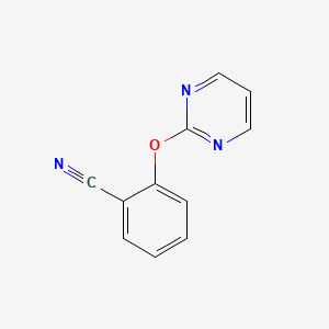 molecular formula C11H7N3O B1423734 2-(Pyrimidin-2-yloxy)benzonitrile CAS No. 1159822-29-3