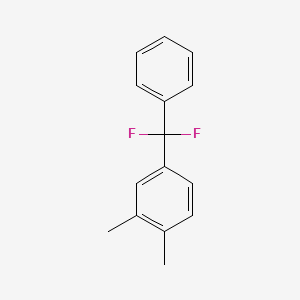 molecular formula C15H14F2 B1424346 4-[Difluoro(phenyl)methyl]-1,2-dimethylbenzene CAS No. 1204295-84-0