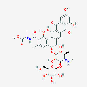 molecular formula C42H48N2O19 B142516 D-Alanine, N-((5-((4,6-dideoxy-3-O-beta-D-glucopyranosyl-4-(methylamino)-beta-D-galactopyranosyl)oxy)-5,6,8,13-tetrahydro-1,6,9,14-tetrahydroxy-11-methoxy-3-methyl-8,13-dioxobenzo(a)naphthacen-2-yl)carbonyl)-, (5S-trans)- CAS No. 142062-87-1