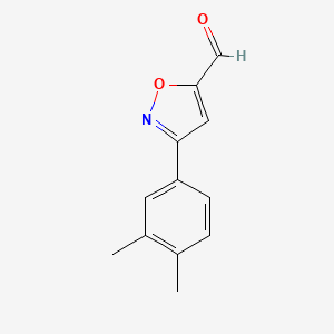 molecular formula C12H11NO2 B1425239 3-(3,4-Dimethylphenyl)isoxazole-5-carbaldehyde CAS No. 885273-72-3