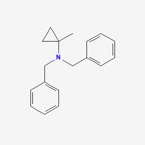 molecular formula C18H21N B14254286 N,N-Dibenzyl-1-methylcyclopropan-1-amine CAS No. 176209-20-4