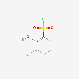 molecular formula C6H4Cl2O3S B1425960 3-Chloro-2-hydroxybenzene-1-sulfonyl chloride CAS No. 1261585-06-1
