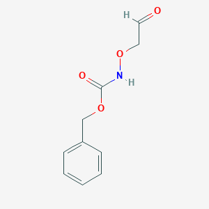 molecular formula C10H11NO4 B14262435 Benzyl (2-oxoethoxy)carbamate CAS No. 141420-62-4