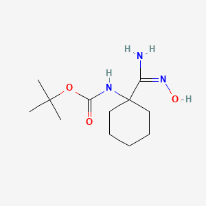 molecular formula C12H23N3O3 B1426279 tert-butyl N-{1-[(E)-N'-hydroxycarbamimidoyl]cyclohexyl}carbamate CAS No. 1344803-08-2