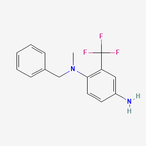 molecular formula C15H15F3N2 B1426375 1-N-benzyl-1-N-methyl-2-(trifluoromethyl)benzene-1,4-diamine CAS No. 1179928-61-0