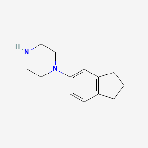 molecular formula C13H18N2 B1427606 1-(2,3-dihydro-1H-inden-5-yl)piperazine CAS No. 58820-35-2