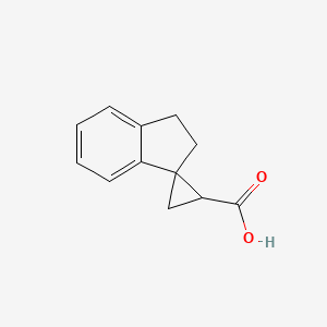 molecular formula C12H12O2 B1428062 2',3'-Dihydrospiro[cyclopropane-1,1'-indene]-3-carboxylic acid CAS No. 1250150-08-3