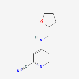 4-[(Oxolan-2-ylmethyl)amino]pyridine-2-carbonitrile