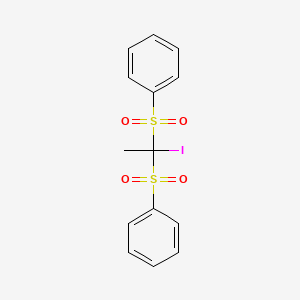 molecular formula C14H13IO4S2 B14291604 Benzene, 1,1'-[(1-iodoethylidene)bis(sulfonyl)]bis- CAS No. 119804-22-7