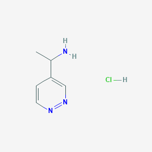 molecular formula C6H10ClN3 B1429163 1-(Pyridazin-4-yl)ethanamine hydrochloride CAS No. 1149585-79-4