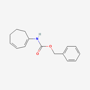 molecular formula C15H17NO2 B14296190 Benzyl cyclohepta-1,3-dien-1-ylcarbamate CAS No. 113340-15-1