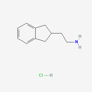 molecular formula C11H16ClN B1429846 2-(2,3-dihydro-1H-inden-2-yl)ethan-1-amine hydrochloride CAS No. 1803570-92-4