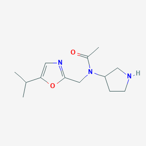 molecular formula C13H21N3O2 B1430122 N-{[5-(propan-2-yl)-1,3-oxazol-2-yl]methyl}-N-(pyrrolidin-3-yl)acetamide CAS No. 1394716-46-1