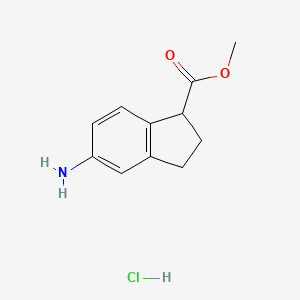 Methyl 5-amino-2,3-dihydro-1H-indene-1-carboxylate hydrochloride
