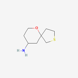 molecular formula C8H15NOS B1431747 6-Oxa-2-thiaspiro[4.5]decan-9-amine CAS No. 1421601-02-6