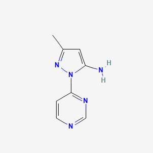 molecular formula C8H9N5 B1432473 3-methyl-1-(pyrimidin-4-yl)-1H-pyrazol-5-amine CAS No. 1502933-87-0