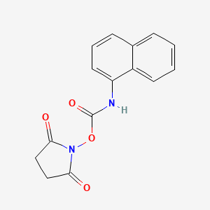 molecular formula C15H12N2O4 B14326450 Succinimido 1-naphthylcarbamate CAS No. 103835-64-9