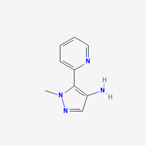 molecular formula C9H10N4 B1433024 1-methyl-5-(pyridin-2-yl)-1H-pyrazol-4-amine CAS No. 1394042-45-5