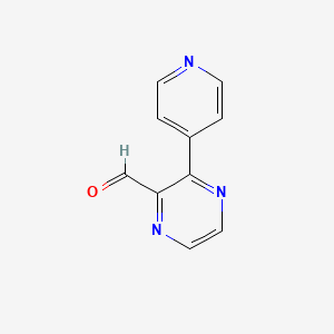 molecular formula C10H7N3O B1433062 3-(Pyridin-4-yl)pyrazine-2-carbaldehyde CAS No. 1823606-96-7