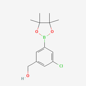 molecular formula C13H18BClO3 B1433629 (3-Chloro-5-(4,4,5,5-tetramethyl-1,3,2-dioxaborolan-2-yl)phenyl)methanol CAS No. 1112210-59-9