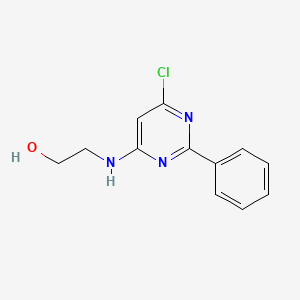 molecular formula C12H12ClN3O B1433716 2-[(6-Chloro-2-phenylpyrimidin-4-yl)amino]ethan-1-ol CAS No. 1707681-73-9
