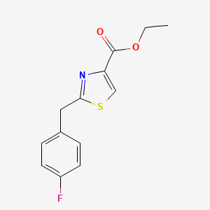 molecular formula C13H12FNO2S B1433962 Ethyl 2-[(4-fluorophenyl)methyl]-1,3-thiazole-4-carboxylate CAS No. 1558527-95-9