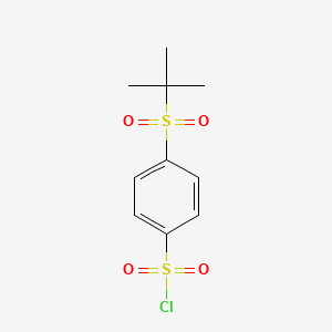 molecular formula C10H13ClO4S2 B1433984 4-(2-Methylpropane-2-sulfonyl)benzene-1-sulfonyl chloride CAS No. 1601749-56-7