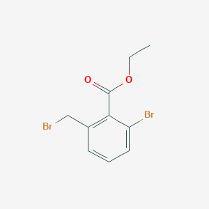 molecular formula C10H10Br2O2 B1434633 Ethyl 2-bromo-6-(bromomethyl)benzoate CAS No. 1261851-80-2