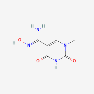 molecular formula C6H8N4O3 B1435200 N'-hydroxy-1-methyl-2,4-dioxo-1,2,3,4-tetrahydropyrimidine-5-carboximidamide CAS No. 1242336-44-2